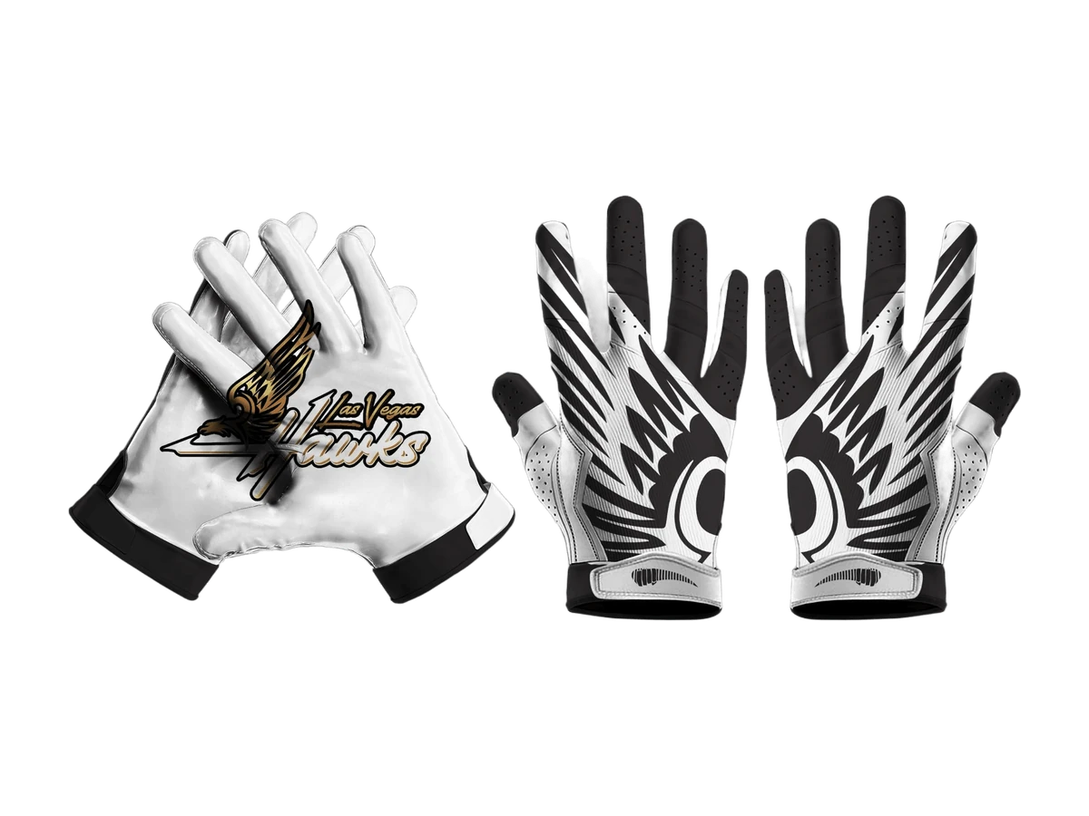 Black, white, and red football gloves arranged as a product study.