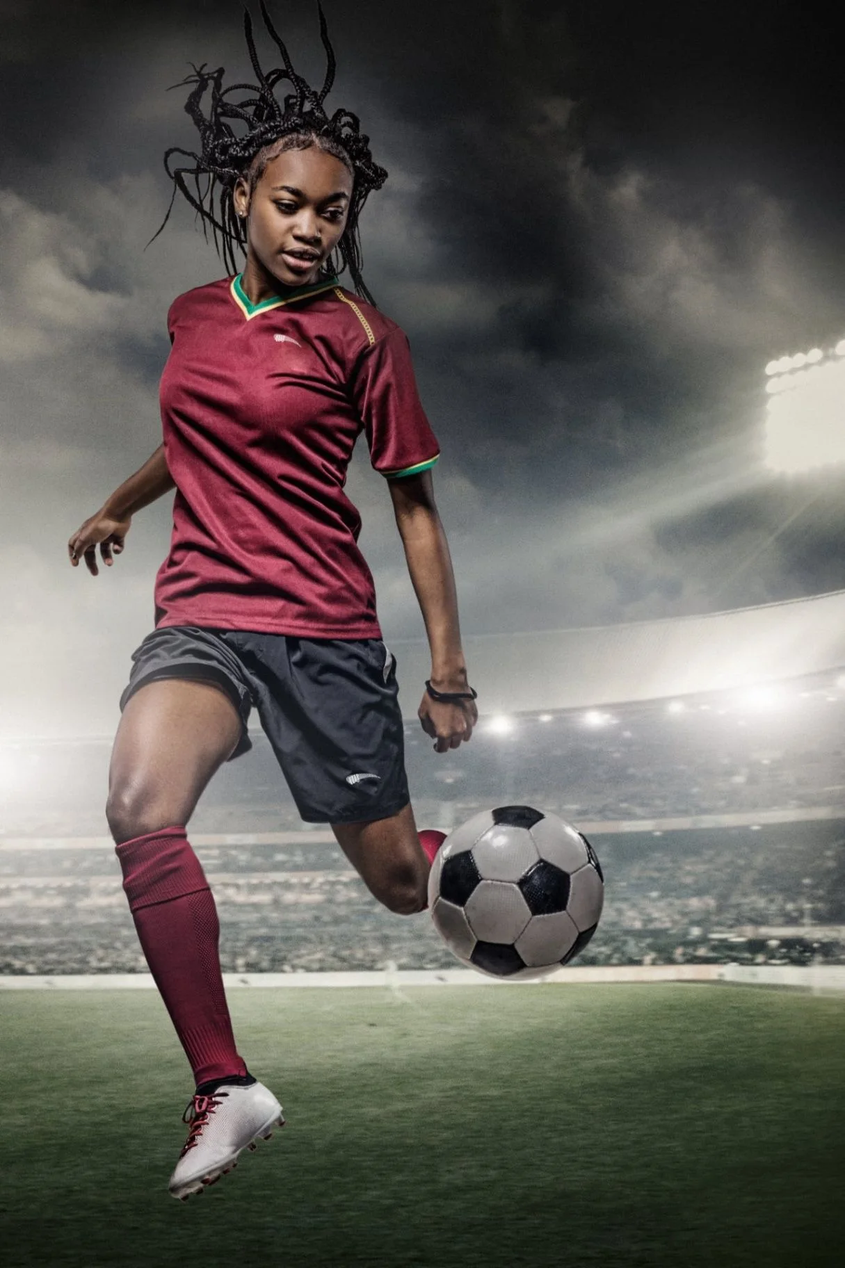 Soccer player in a Roc Street kit controlling a ball