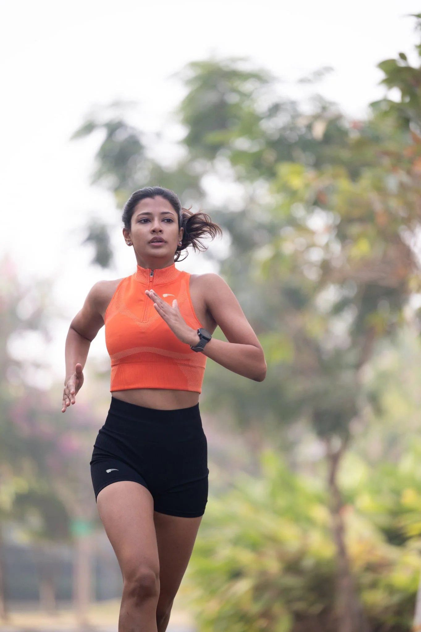 Runner in a Roc Street training outfit on steps